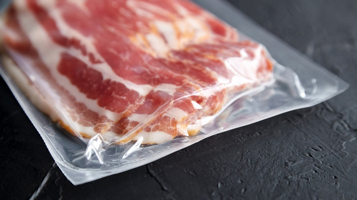 Vacuum-sealed package of raw meat