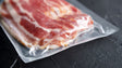 Vacuum-sealed package of raw meat